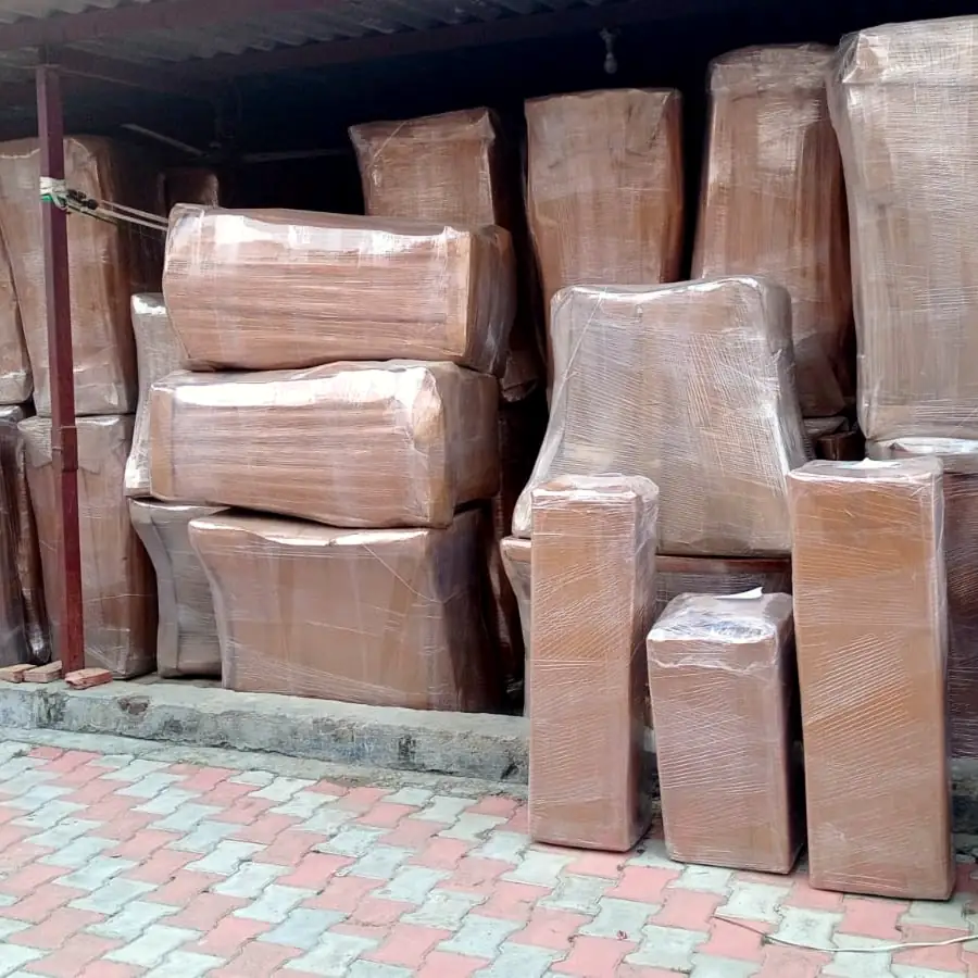 Stack of wrapped furniture pieces