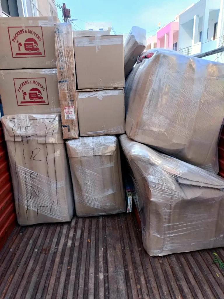 Cartons and wrapped furniture in a truck